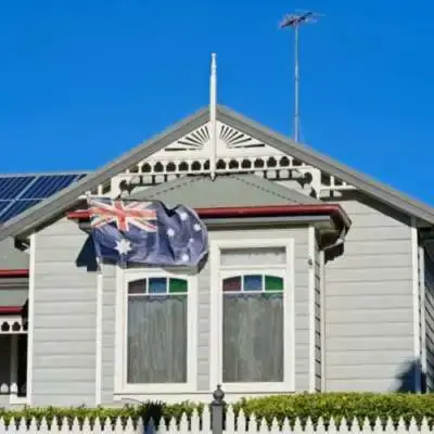 House with solar panel and Australian flag